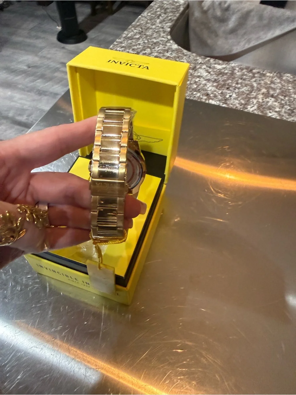 Invicta Gold Tone Watch with Blue-Green Dial